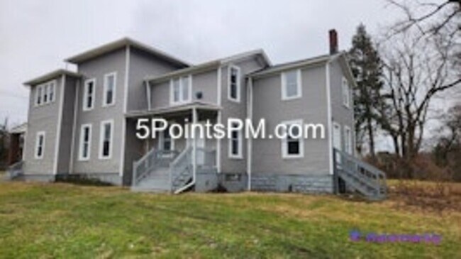 Building Photo - 9804 Miles Ave