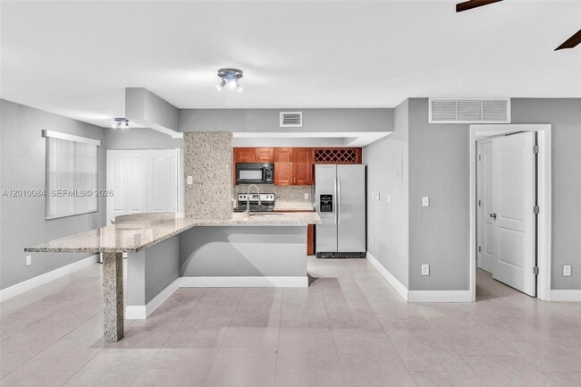 Building Photo - 2881 N Oakland Forest Dr Unit 105