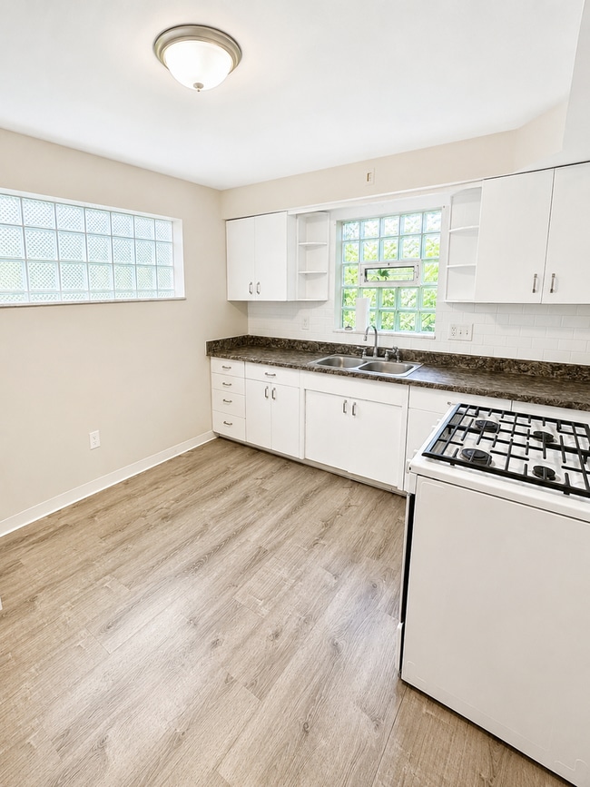 Photo - Charming 3-Bedroom Home with Hardwood Floors, Garage & Private Patio