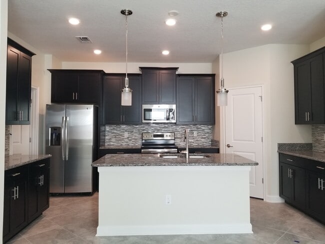 Photo - Must See Oaks at Moss Park Home!