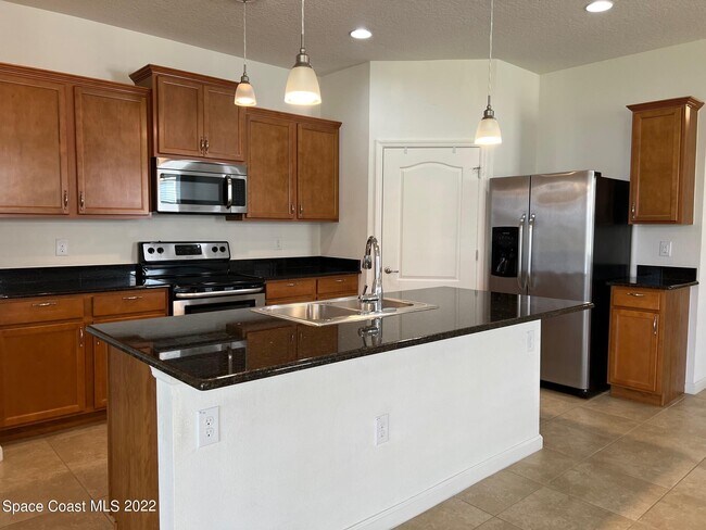 Photo - 728 Remington Green Dr SE