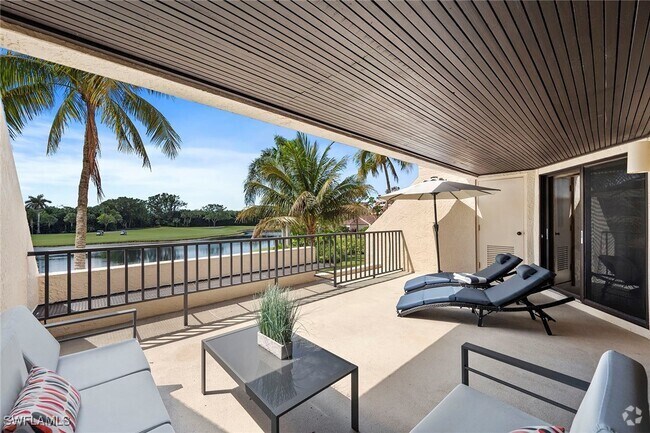Building Photo - 6360 Pelican Bay Blvd Unit C-105 Rental