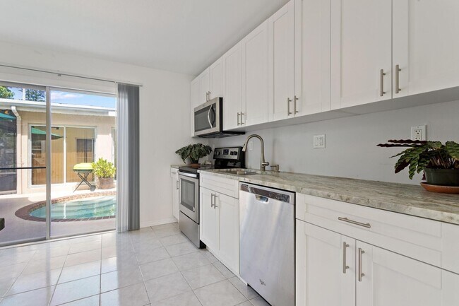 Photo - 216 Ocean Breeze Unit #1 Poolside