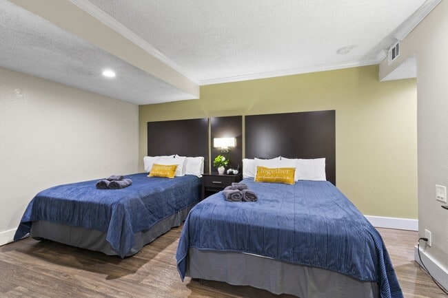 Fusion Orlando - Furnished Bedroom with Two Beds