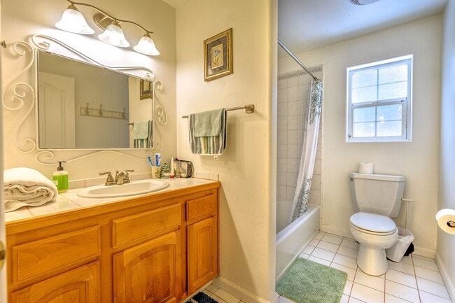 Photo - Large mountain home with 2 car garage and fenced in back yard.