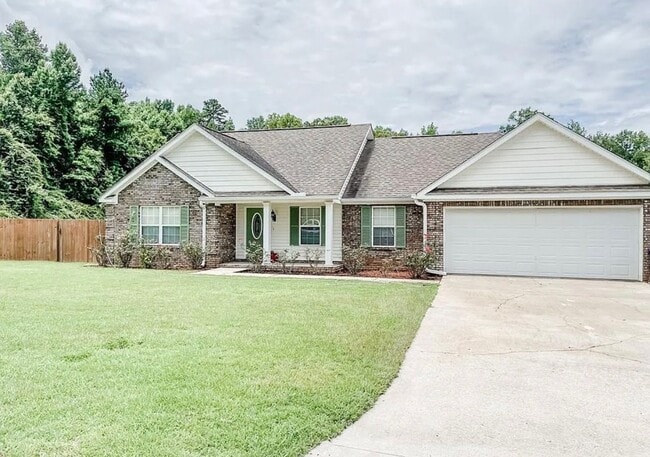 Building Photo - Charming 3/2 furnished home on quiet street