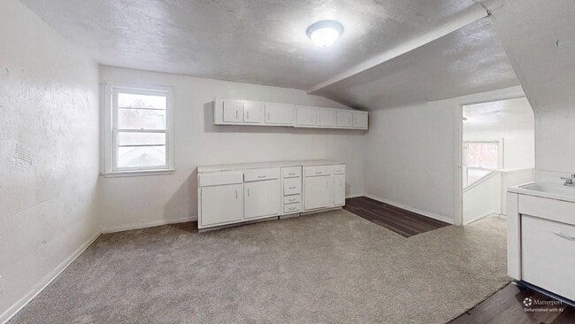 Building Photo - 3863 E 154th St Unit 3