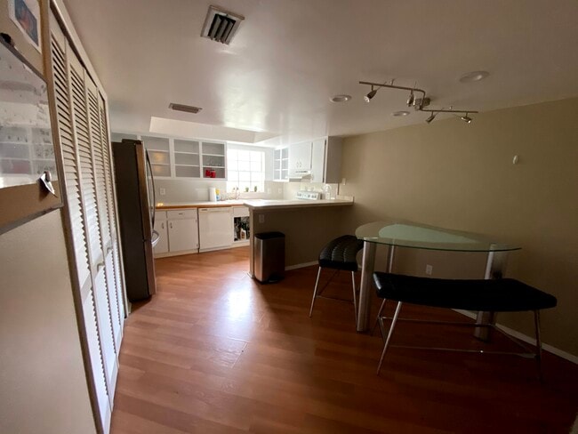 Kitchen with pantry. Overlooks the unit's parking area. - 14448 Reuter Strasse Cir Casa Adosada