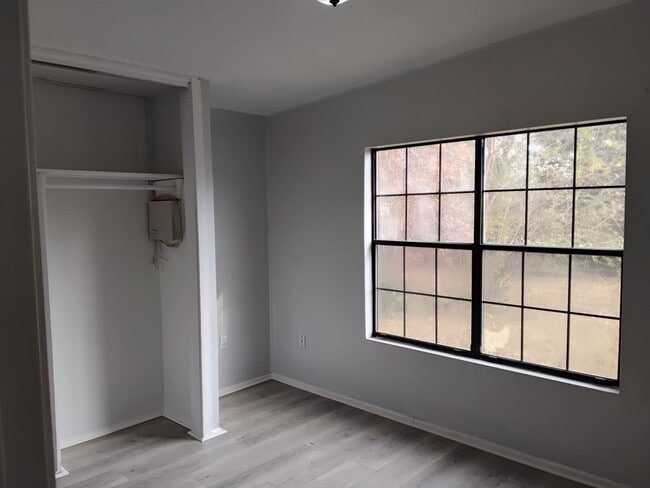 Photo - New Paint & New laminate flooring throughout home!!