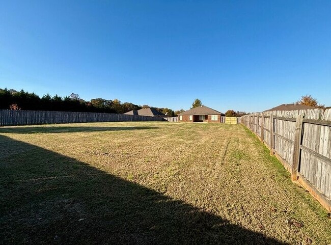 Photo - Fenced Yard with a HUGE Back Yard
