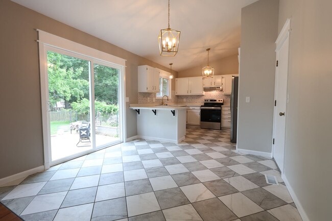 Photo - Updated 3BR/2BA Ranch with Garage, Basement & Community Pool