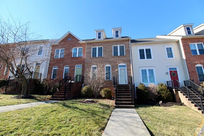 Building Photo - Upscale townhome  with attached garage for...