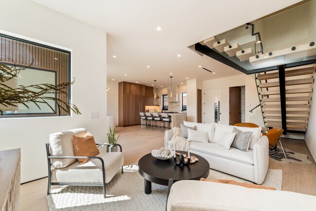 Cozy living room filled with natural light - 836 Waterloo St