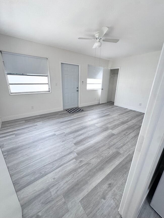 Living Room / Dining Room - 1030 Superior St Unit Back Apartment
