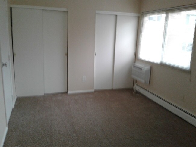 Bedroom with double closets