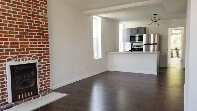 Great Room Looking Towards the Kitchen and Bedroom - 4410 Swan Ave Apartments Unit 4410A