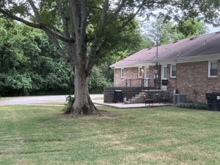 Main entrance is the backdoor by the parking lot. - 309 Pleasant Dr