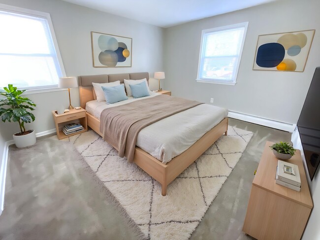 Staged Primary Bedroom w/ Ensuite - 14 Pierce Ave Unit E1