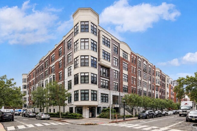 Building Photo - 1300 Grand St Unit 417
