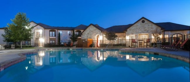 Pool at Night - The Cove at Saddle Creek Apartments