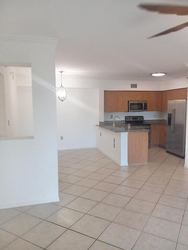 Building Photo - 6450 Emerald Dunes Dr Unit 301