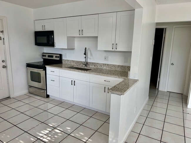 Building Photo - POS Holdings LLC-718-720 Unit POS Holdings LLC - 718