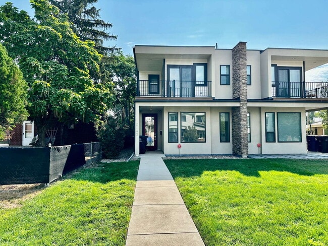 Building Photo - Available July! Spacious 3-Bedroom Townhouse with 3.5 Baths in Vibrant Sloans Lake!