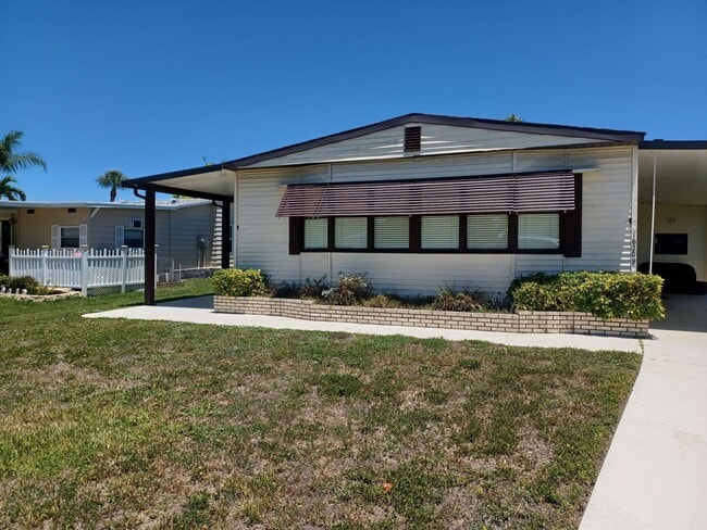 Building Photo - 55 + Community Turn Key 2 Bedroom / 2 Bathroom Home in a Private Gated Community Furnisher Negoti...