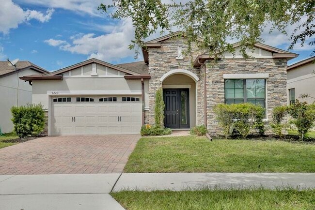 Building Photo - Stylish 4/3 Home with Covered Patio & Gara...