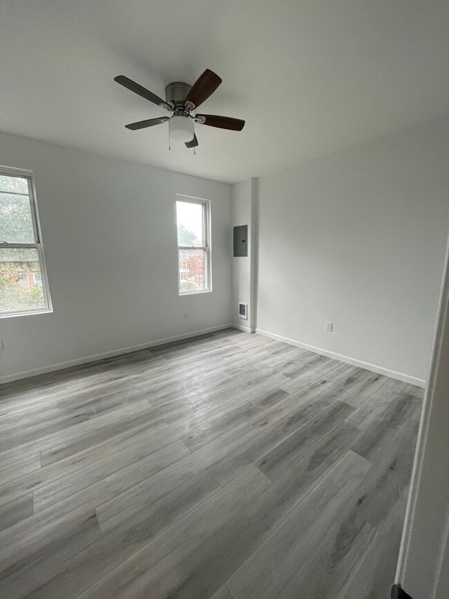 Front room with ceiling fan