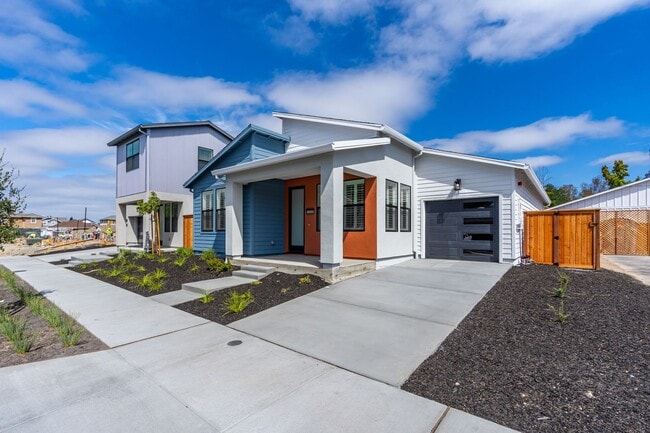 Photo - Bright and Beautiful 3 bedroom 2 full bathroom Home! Attached two car tandem garage with large en...