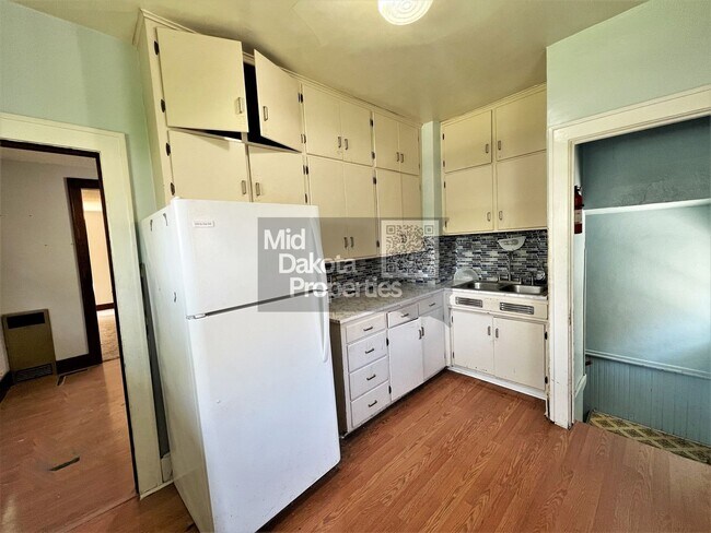 Photo - 414 W 11th- 4 bedroom house with a garage