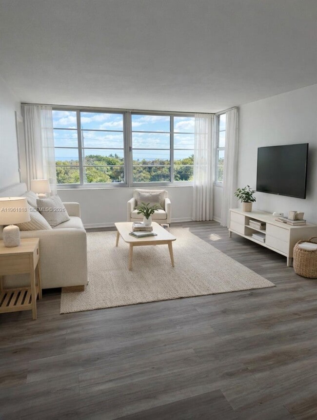 Building Photo - 8000 Harding Ave Unit 5C