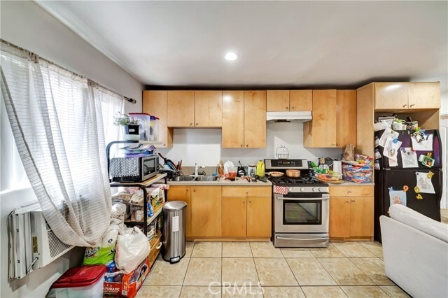 Building Photo - 6735 Elmer Ave Unit 18
