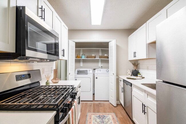Newly Renovated Kitchen with Gas Stove and In-Home Washer & Dryer - Rosemont at East Cobb Apartments