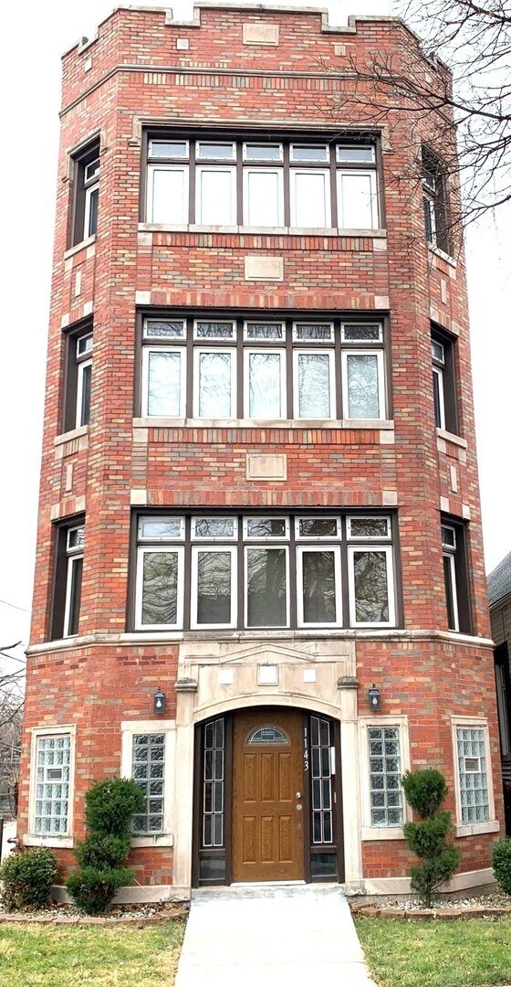 Building Photo - 1143 E 81st Pl Unit 1