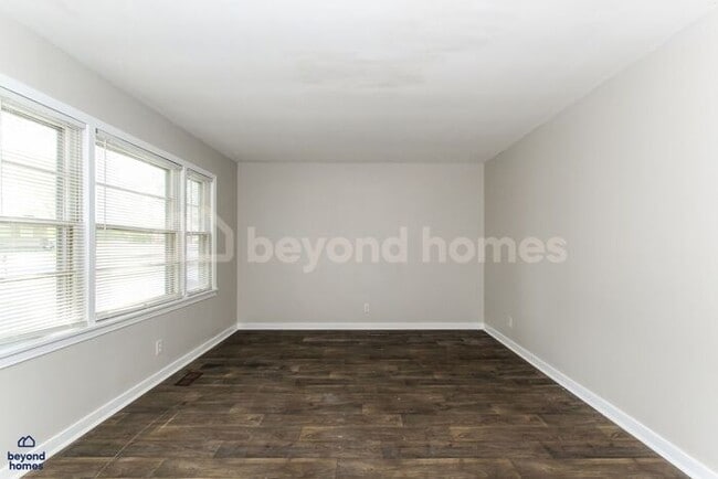 Photo - Updated Bungalow with Massive Deck and Fully Fenced Yard!