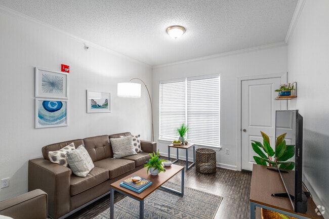 4 BR, 4 BA - 1228SF - Living Room