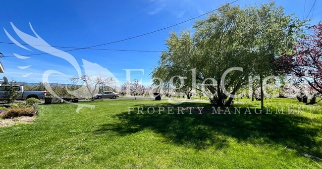 Photo - 3 Bed, 2 Bath Home with Open Yard in Desirable Orchards Area