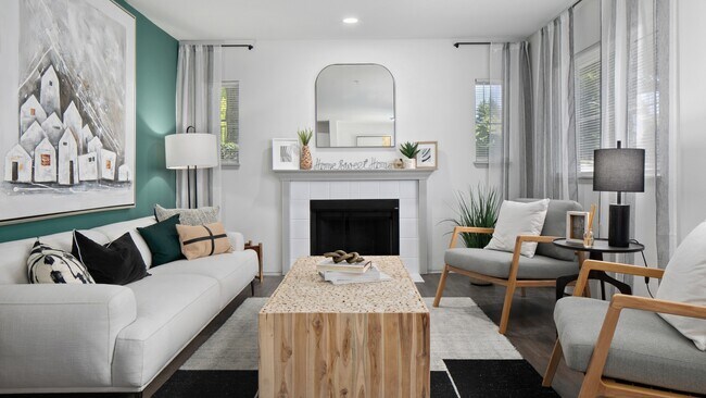 Cozy wood-burning fireplace in select homes