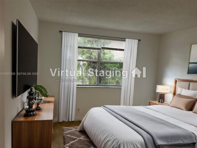 8851 Wiles Rd Unit 208