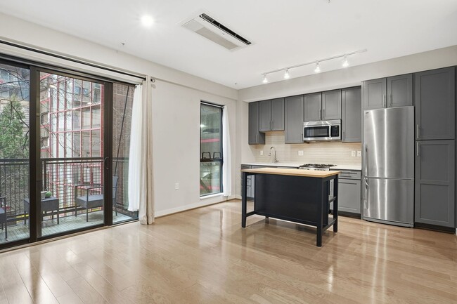 Building Photo - Modern 1BR Condo Steps to Metro, Parks & New Rec Center!