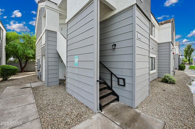 Building Photo - 3065 N 67th Ave Unit 222