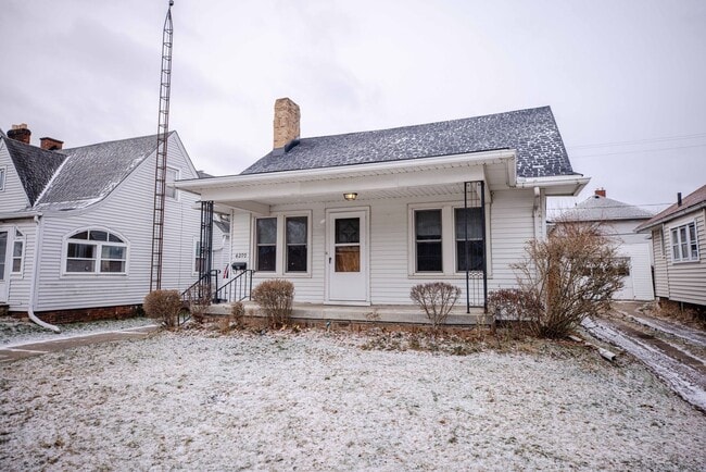 Photo - Beautiful two bedroom home with bonus room, fenced in back yard, garage, and full basement!