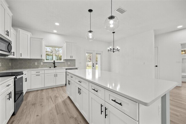 Photo - New Construction 3/2 in Bronson