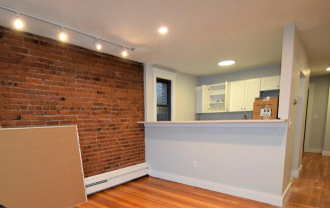 Building Photo - $2,800 Top-Floor 2-Bedroom Near Boston College | Heat & Hot Water Included | Pet Friendly