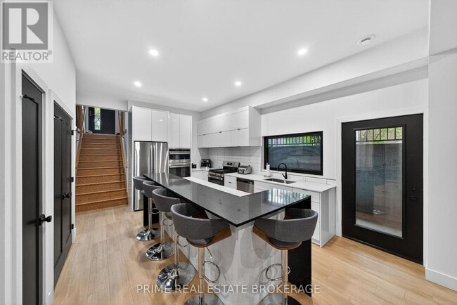 Photo - 417 Base Line Rd E Unit 3