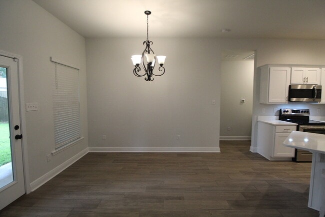 Photo - Sweetbarb Estates 3BR Home Near I-10 & Pine Forest Rd with Quartz Kitchen, Tile Floors, 2-Car Gar...