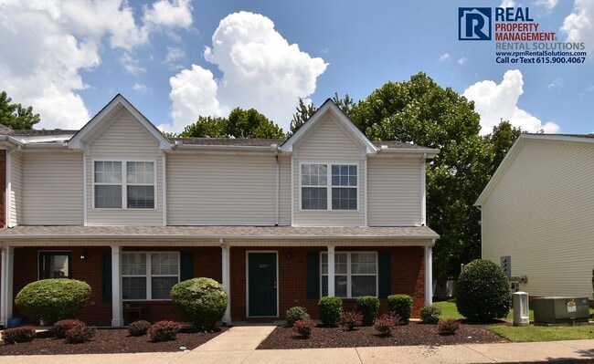 Building Photo - Adorable End Unit 2 bd Townhome with lawnc...