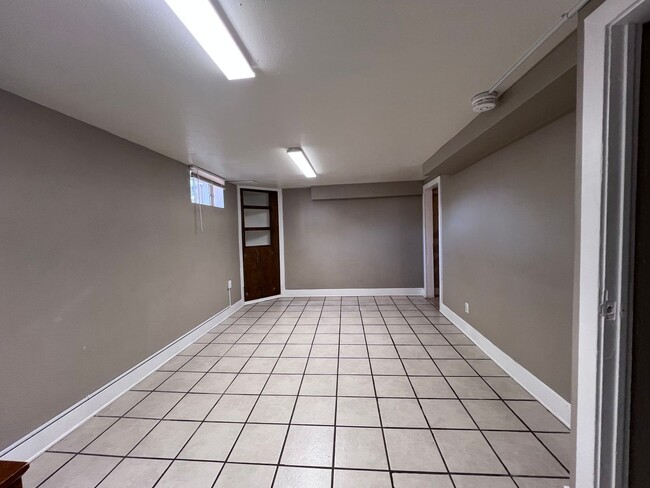 Photo - Lower Level of Charming 1BR Townhome in De...